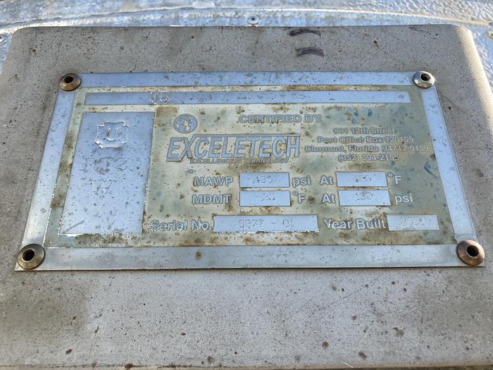 Used Used ExceleTech Inc. approximately 2500 gallon 304 stainless steel vertical pressure tank