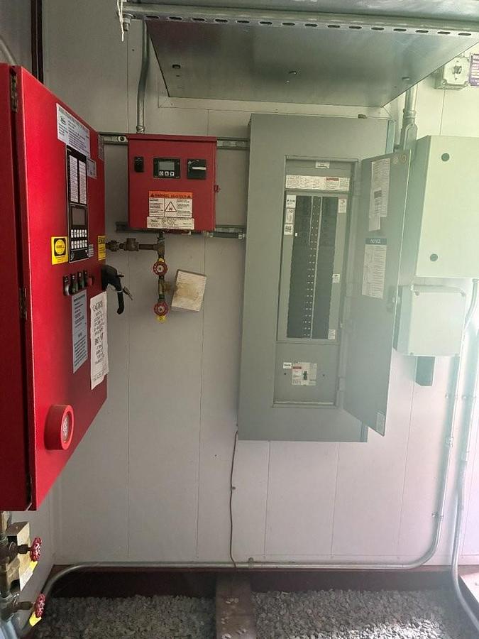 Unused Complete Diesel Fire Pump System in skidded Building