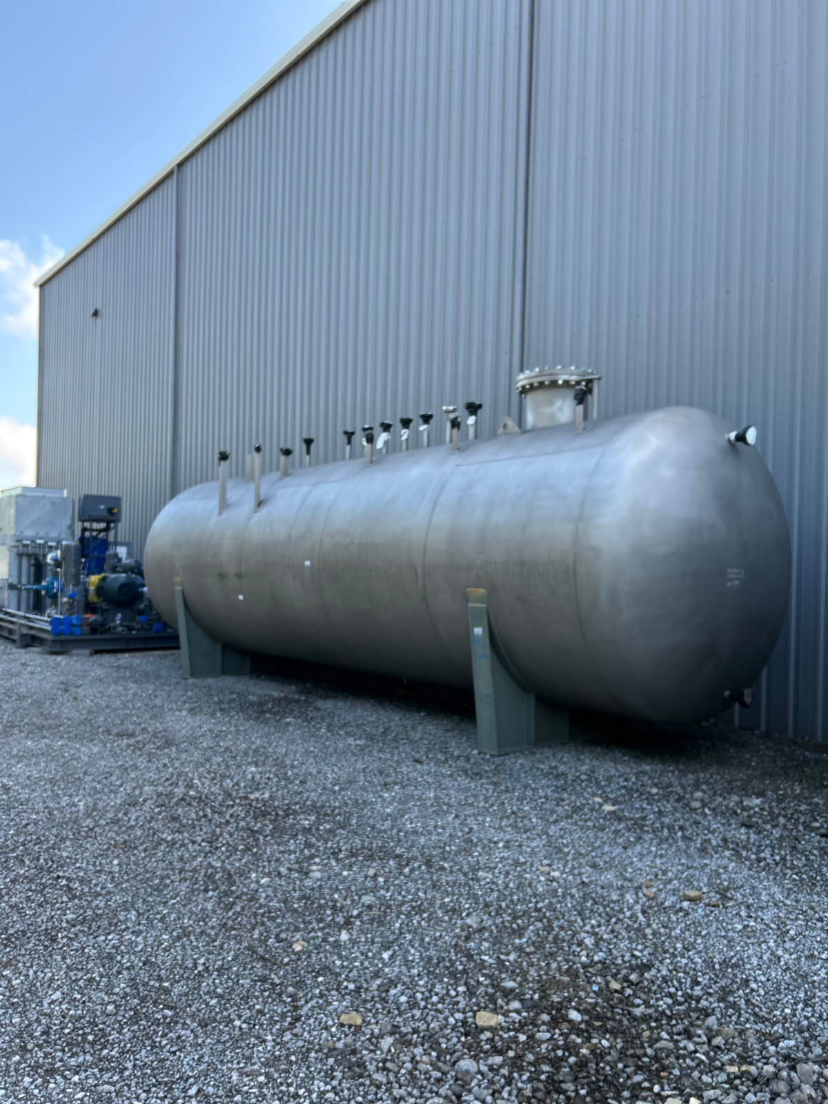 Unused Peerless Mfg. 13,000 gallon 304L stainless steel horizontal pressure tank