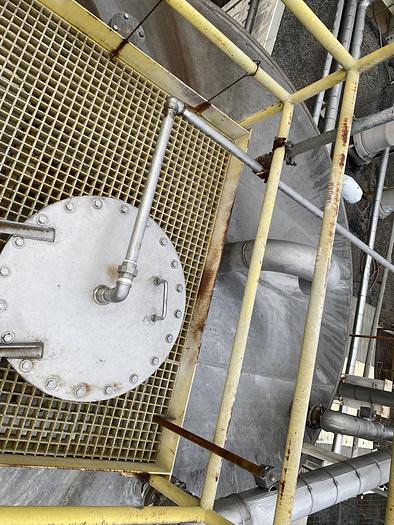 Used Used approximately 16,000 gallon 304 stainless steel vertical tank