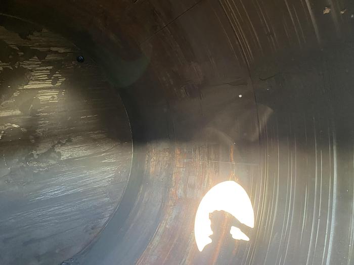 Used Used approximately 8500 gallon vertical stainless steel tank