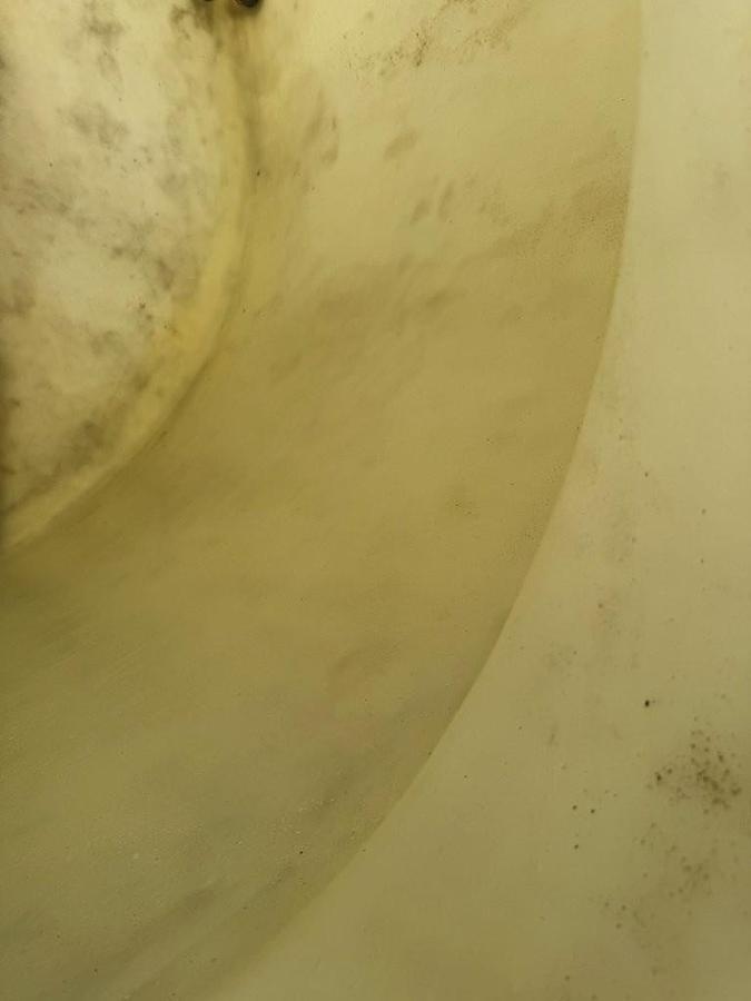 Used Used Norwesco 1550 gallon Polyethylene vertical storage tank