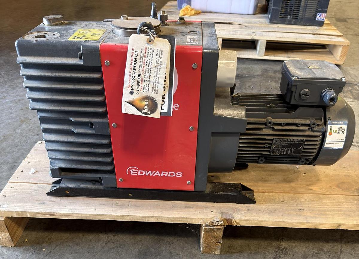 Unused Edwards model E2M40 2 stage oil-seal rotary vane mechanical vacuum pump.