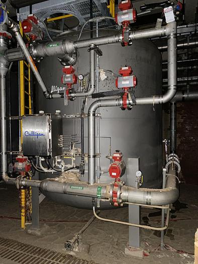 Used Used Culligan approximately 2,500 gallon stainless steel media tank