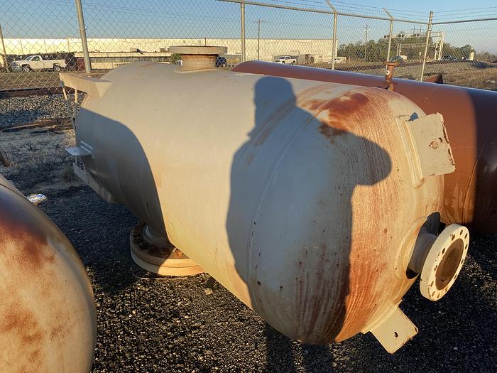 Used Unused Merrill Fabricators Inc. approximately 650 gallon vertical carbon steel pressure tank.