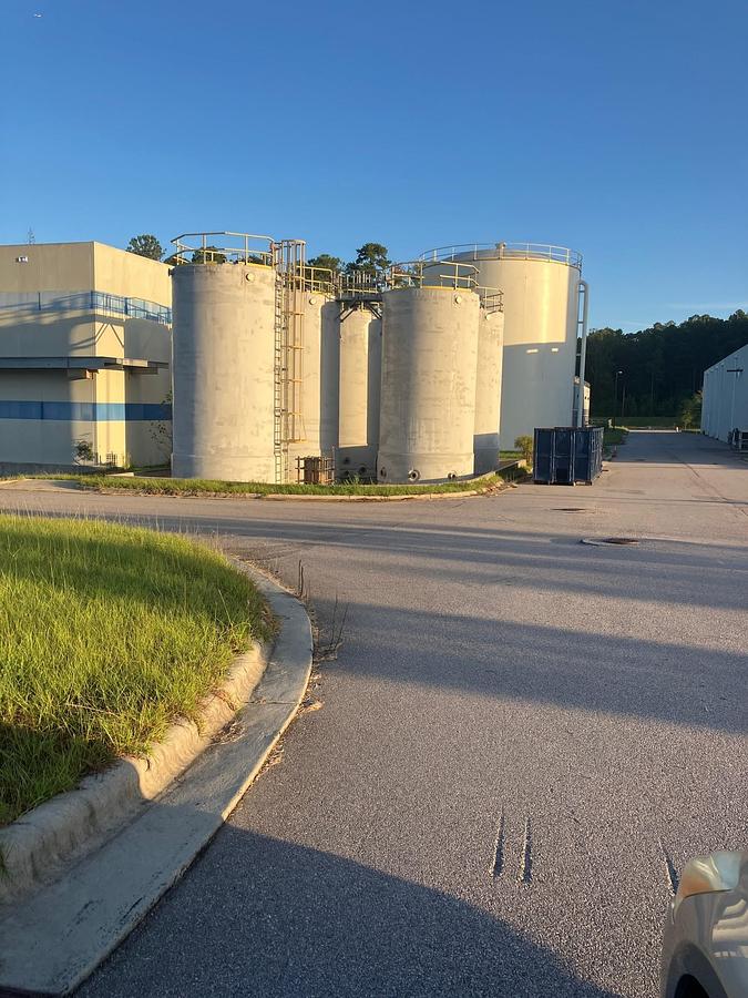 Unused Augusta Fiberglass 30,000 gallon FRP storage tank.