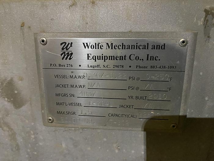 Used Used Wolfe Mechanical approximately 12,600 gallon 304L stainless steel vertical tank