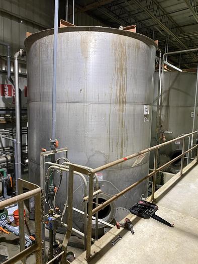 Used Used Wolfe Mechanical approximately 12,600 gallon 304L stainless steel vertical tank. 12' diameter X 15' high straight side