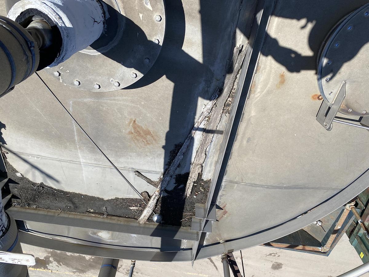 Used Used Knight Fabrication approximately 14,000 gallon stainless steel vertical tank