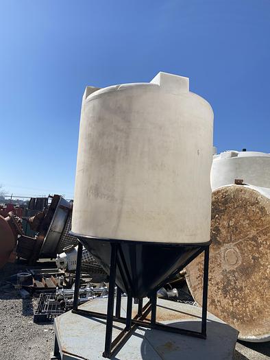 Used Used Assmann approximately 1100 gallon cone bottom poly tank.
