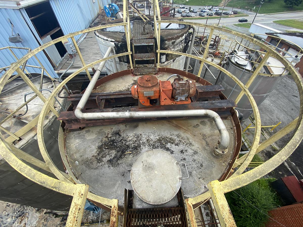 Used Used Industrial Air Inc. approximately 10,000 gallon stainless steel agitated storage tank with internal coils