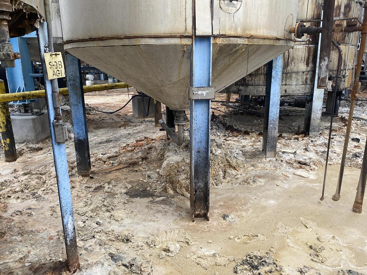 Used Used Industrial Air Inc. approximately 10,000 gallon stainless steel agitated storage tank with internal coils