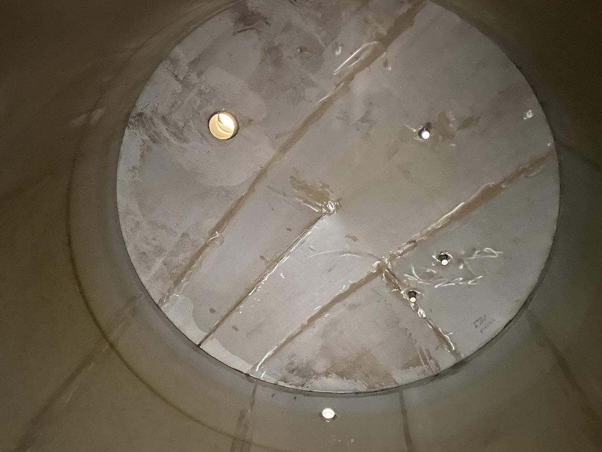 Used Used Chattanooga Boiler and Tank 10,557 gallon 304L stainless steel vertical tank.