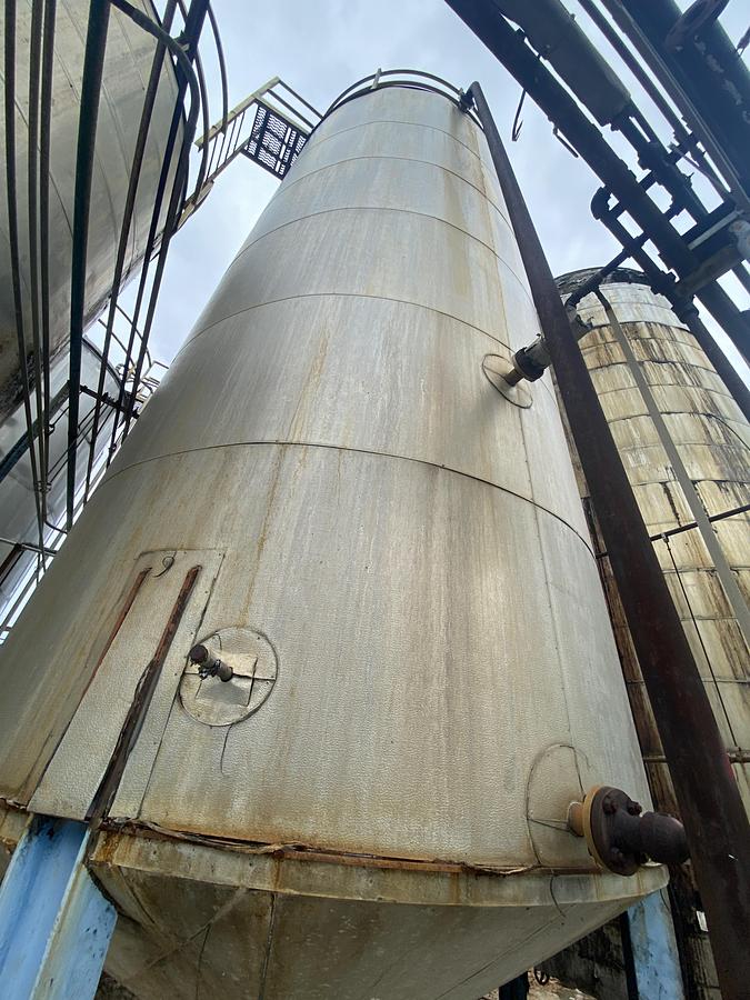 Used Used Industrial Air Inc. approximately 10,000 gallon stainless steel agitated storage tank with internal coils