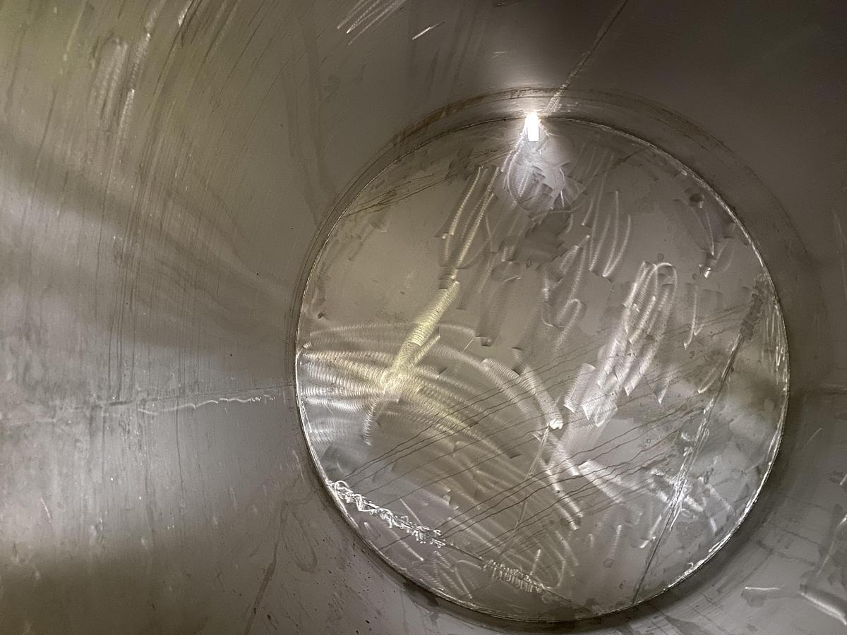 Used Used approximately 6300 gallon stainless steel vertical tank