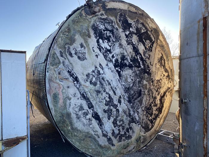 Used Used approximately 8500 gallon vertical stainless steel tank