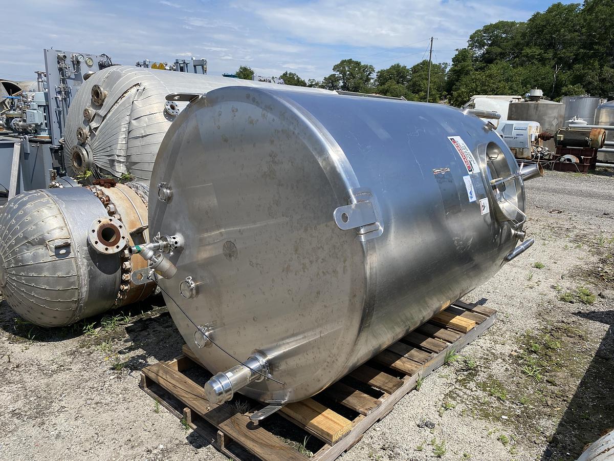 Used Used A & B Process approximately 1,000 gallon sanitary stainless steel vertical tank