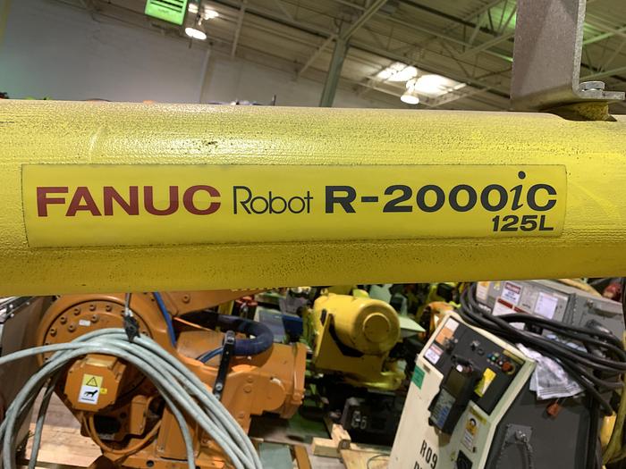 Used FANUC R2000iC/125L 6 AXIS CNC ROBOT WITH R30iB CONTROLLER, IR VISION, 125KG X 3,100 MM H REACH