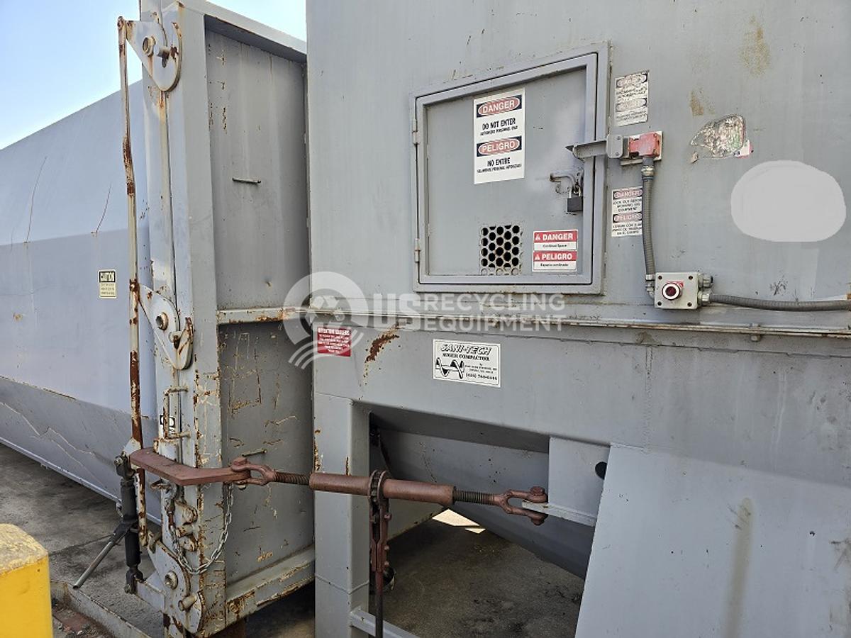 Used 2007 Sani-Tech ST-1546-36 Auger Compactor with (2) Receiver Containers