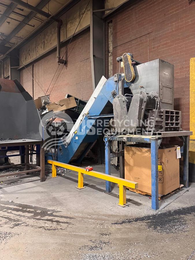Used 2006 Untha RS450 4S Quad Shaft Shredder with Conveyor