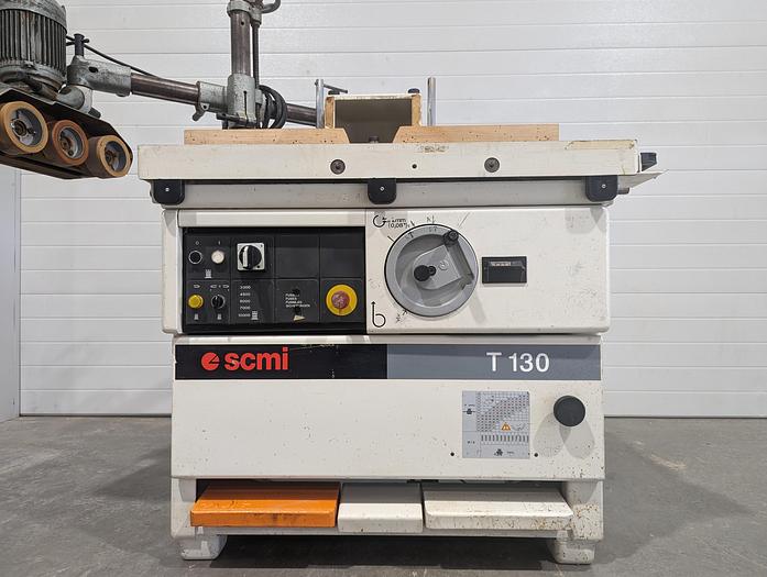 Used 1999 SCMI T130 NPS Sliding Table Shaper with Holz 3 Roll Power Feeder