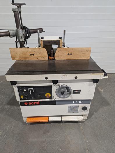 Used 1999 SCMI T130 NPS Sliding Table Shaper with Holz 3 Roll Power Feeder