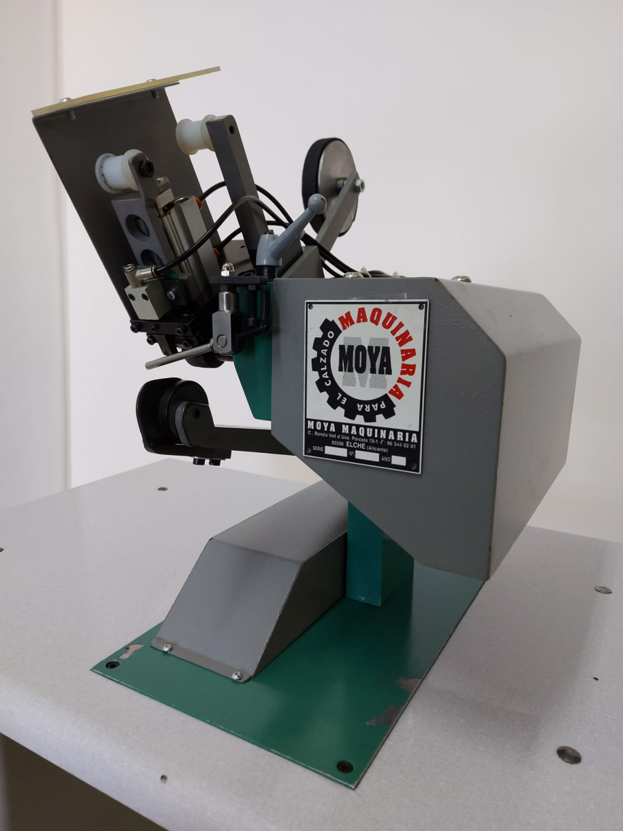 Used SEAM PRESSING AND TAPING MACHINE