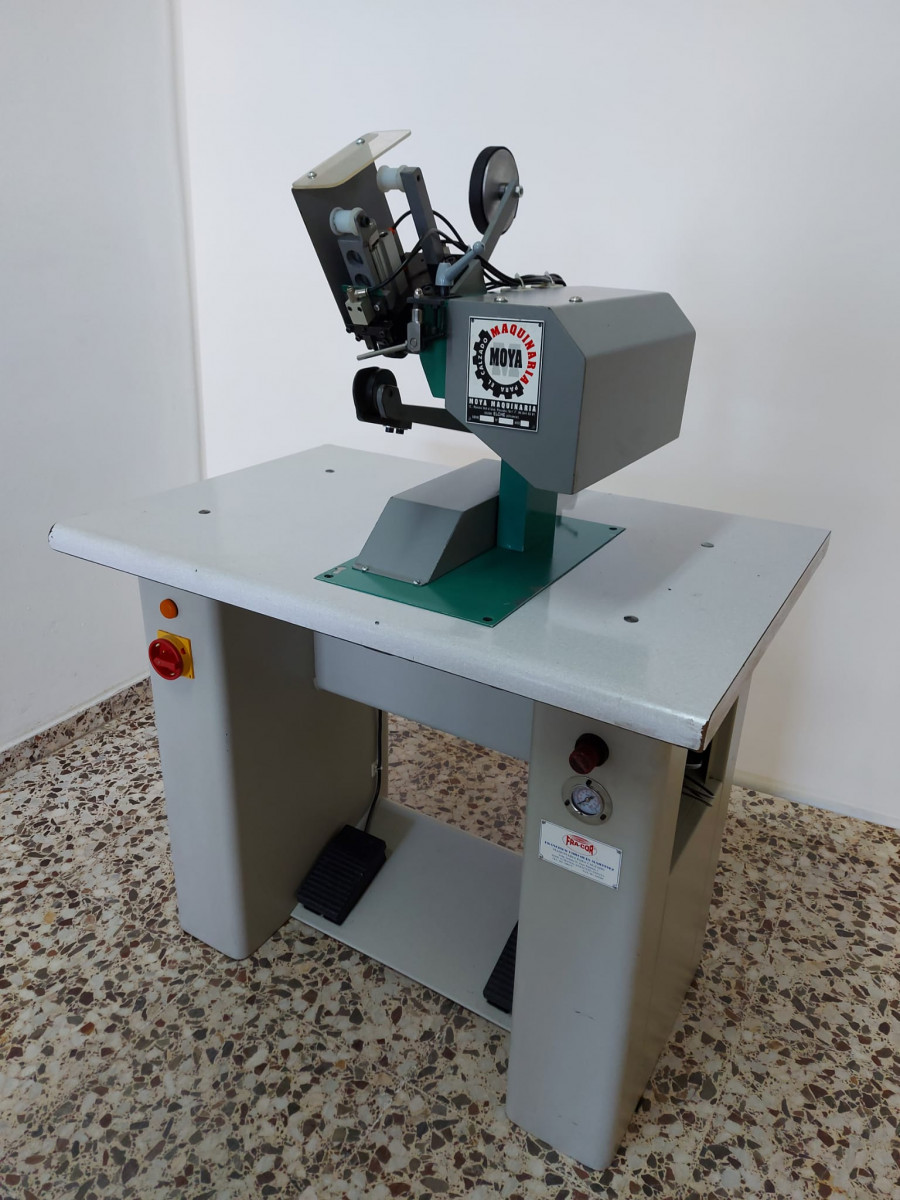 Used SEAM PRESSING AND TAPING MACHINE