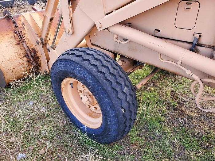 Used Case 580SE Backhoe w/ Attachments