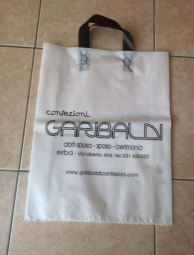 Used 2006 De Bernardi 80G -SH for the production of film soft loop handles bags
