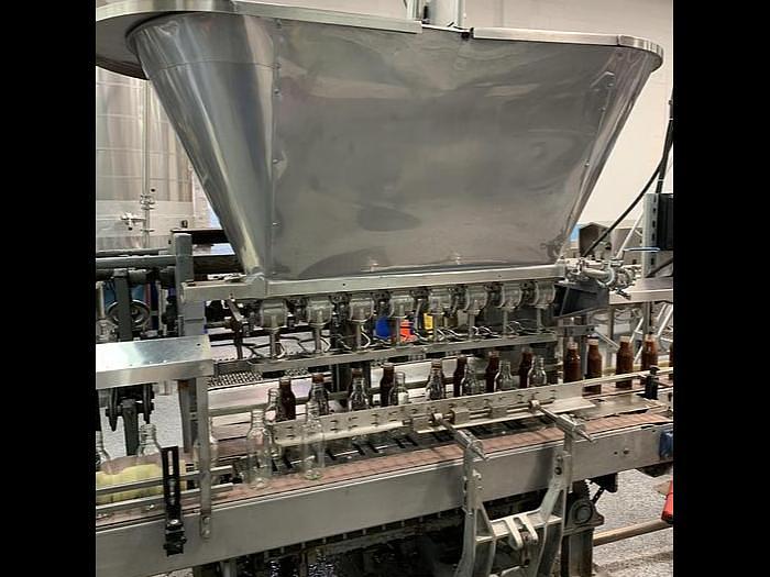Used Colton 8 head filling line for 16oz round bottles - 90-110/min