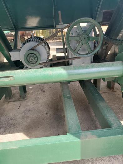 Used 4 Arm Tilthoist with package deck and stick collection belt