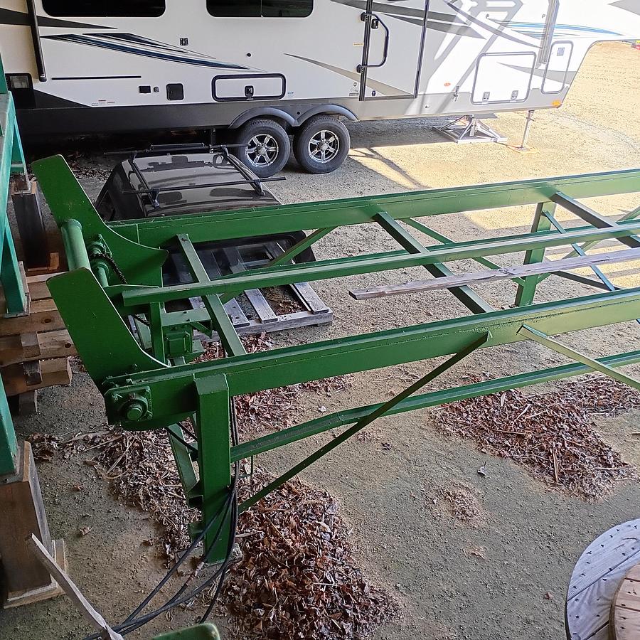 Used Select Sawmill with, Rosserhead style Debarker, log deck and green chain, Mill is a 6” double cut band for seamless back and forth Sawing for logs up to 42” x 22’ long.