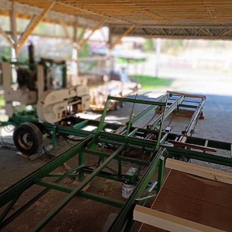 Used Select Sawmill with, Rosserhead style Debarker, log deck and green chain, Mill is a 6” double cut band for seamless back and forth Sawing for logs up to 42” x 22’ long.