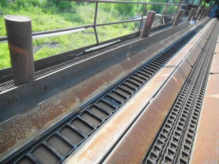 Used 87′ log trough conveyor