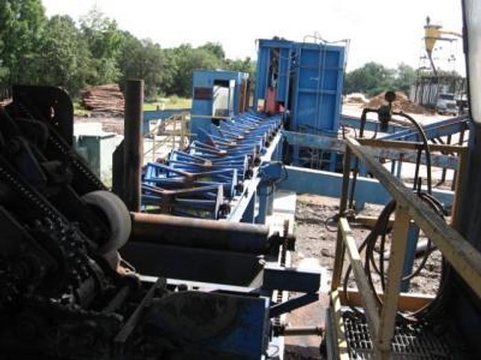 Used Morbark PSP Post and Pole Peeler with Infeed and Outfeed Conveyors