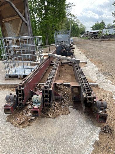Used Mellott 3 Strand Log Deck with drive and Stop and Loader