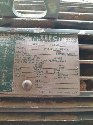 Used Wood-Mizer 4 Head Resaw with run-a-round  