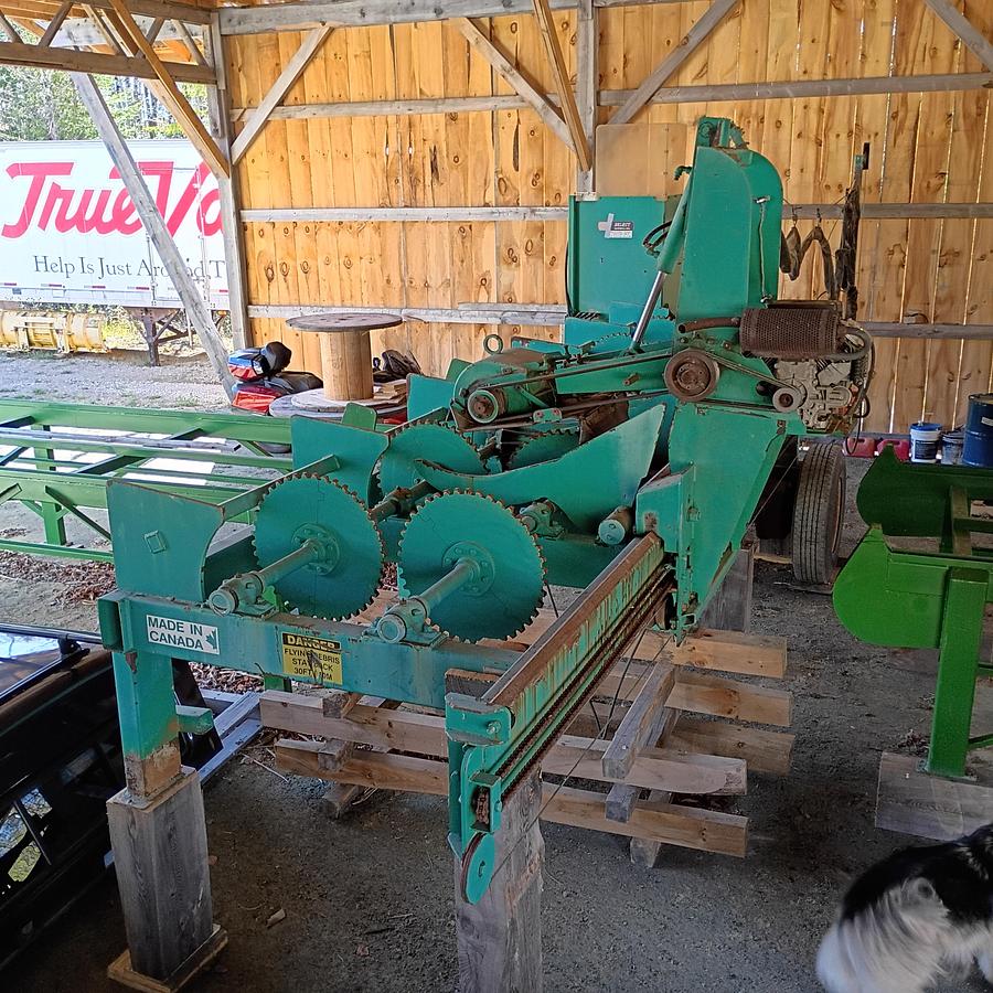 Used Select Sawmill with, Rosserhead style Debarker, log deck and green chain, Mill is a 6” double cut band for seamless back and forth Sawing for logs up to 42” x 22’ long.