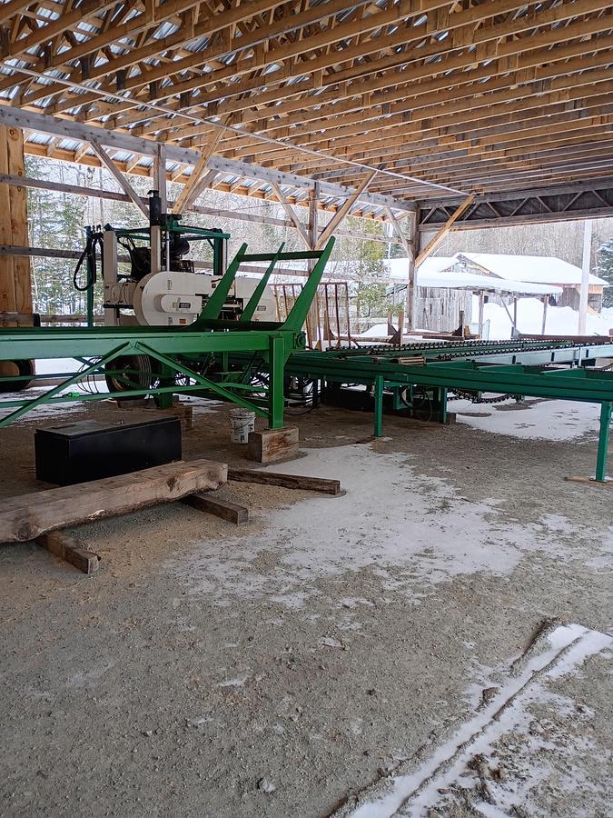 Used Select Sawmill with, Rosserhead style Debarker, log deck and green chain, Mill is a 6” double cut band for seamless back and forth Sawing for logs up to 42” x 22’ long.