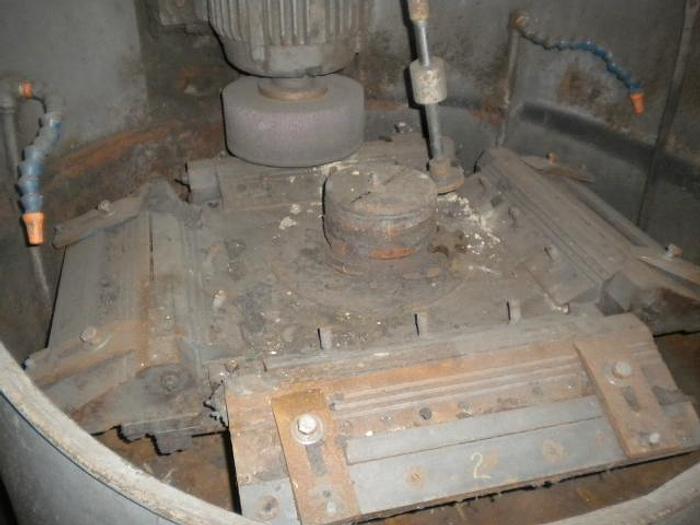 Used Newman G-200 4 knife sharpener