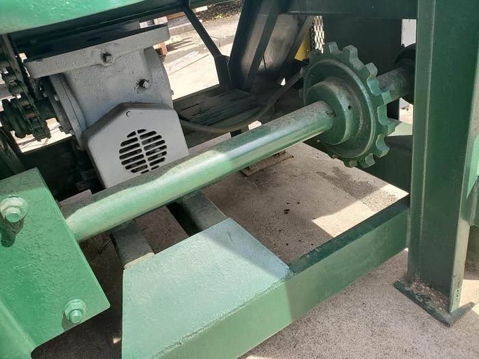 Used 4 Arm Tilthoist with package deck and stick collection belt