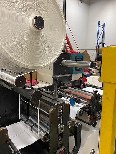 Used 13" WIDE ROTOFLEX DLI REWINDER WITH 2 STATION DIE CUTTING - RECENT DRIVE UPDATE