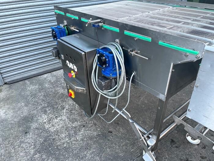 Used SPACING AND FILING CONVEYOR SYSTEM