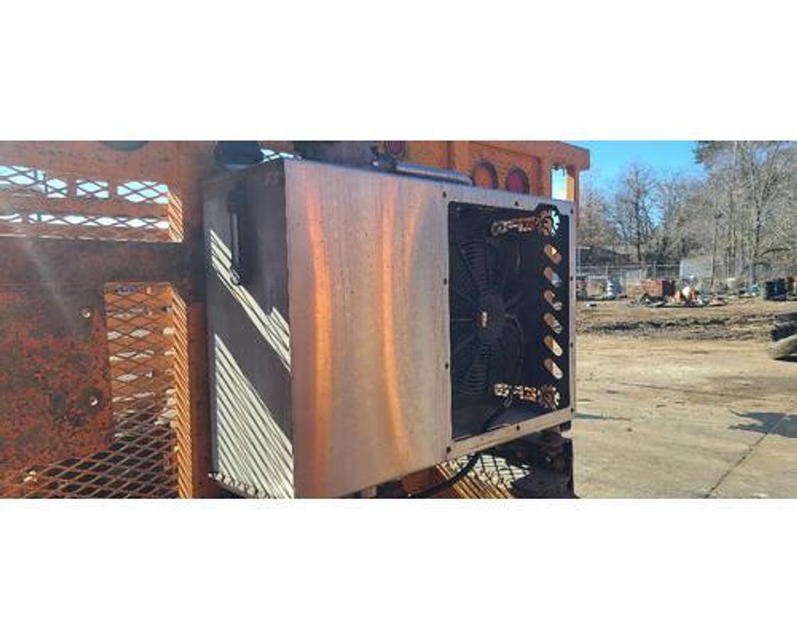 Used USED HEADACHE RACK WITH HYDRAULIC COOLER FOR VACUUM PUMP SYSTEM.