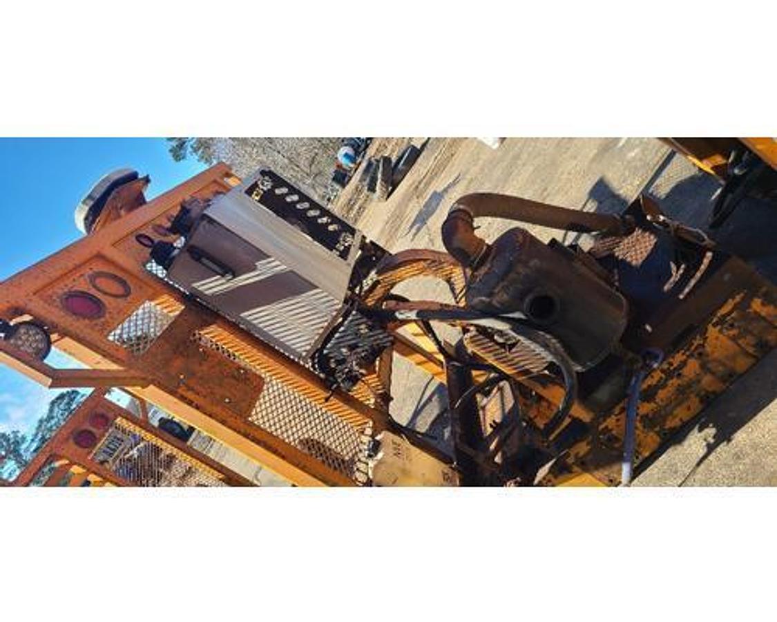 Used USED HEADACHE RACK WITH HYDRAULIC COOLER FOR VACUUM PUMP SYSTEM.