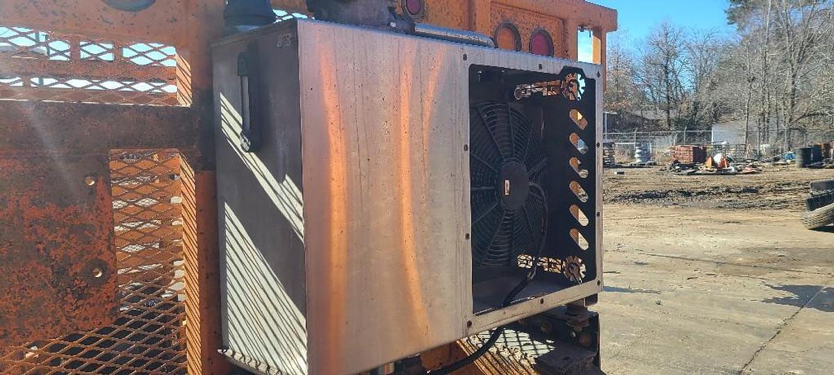 Used USED HEADACHE RACK WITH HYDRAULIC COOLER FOR VACUUM PUMP SYSTEM.