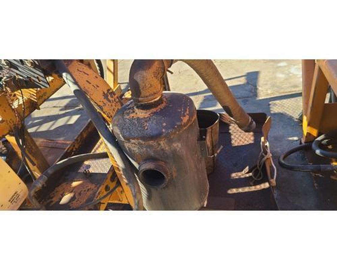 Used USED HEADACHE RACK WITH HYDRAULIC COOLER FOR VACUUM PUMP SYSTEM.