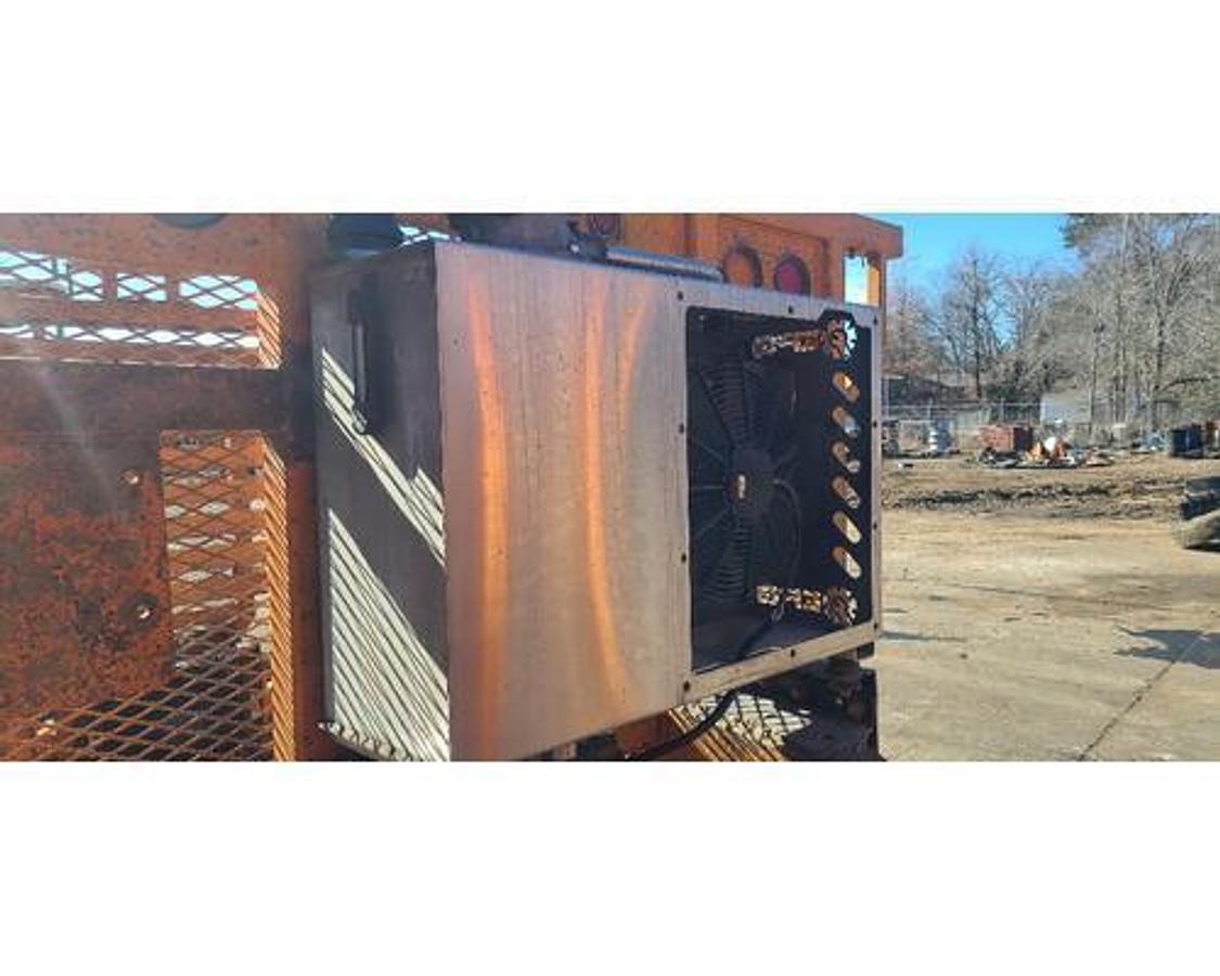 Used USED HEADACHE RACK WITH HYDRAULIC COOLER FOR VACUUM PUMP SYSTEM.