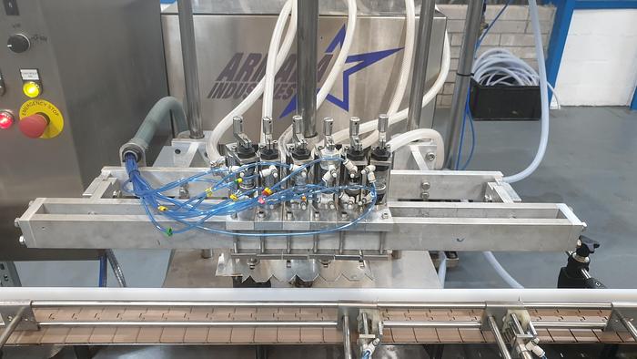 Used King 6 head liquid filler